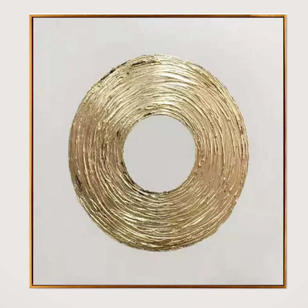 Gold circular art piece on a white background