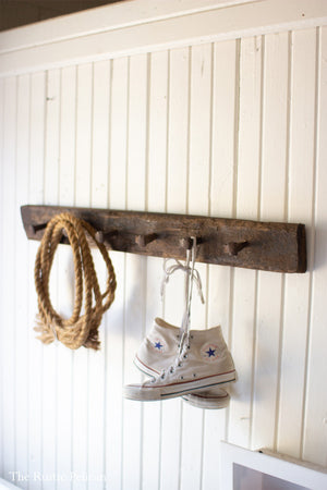 Reclaimed wood coat rack with antique nails and boltz